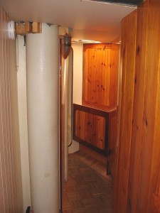 Looking down the forward hallway where there are 3 staterooms and a head (bathroom) and shower.