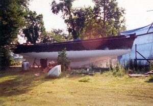 Sand blasting and painting the hull